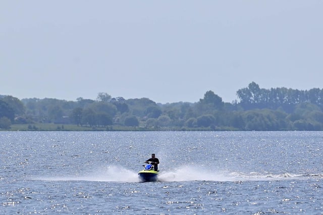 Cooling down in the hot weather at Lough Shore Park in Antrim.