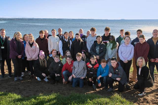 Students from Holy Trinity College are pictured with representatives of Lough Neagh Partnership and Henry Brothers during a visit to Lough Neagh as part of a pilot schools engagement programme which was successfully delivered by Lough Neagh Partnership and involved The Henry Group of Companies in Magherafelt. Credit: Supplied