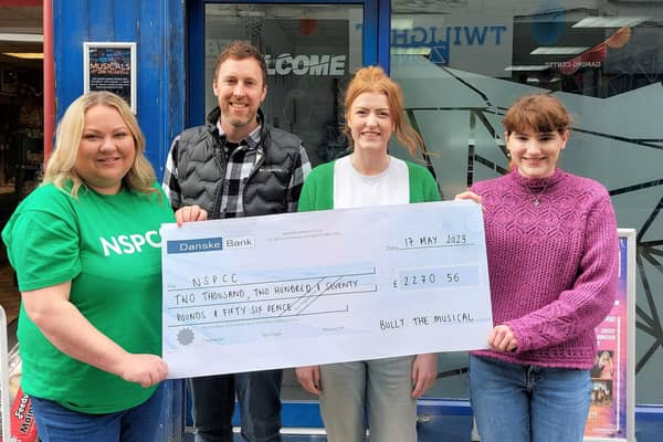 Stefani Mearns (left), NSPCC NI fundraising supporter manager, receives a cheque for £2,270.56 from Ryan Moffett and Sophie Grier from Uplift Performing Arts and writer and composer, Keira Aiken.  Photo submitted by NSPCC NI.