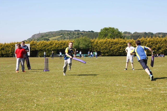 Whitehead Primary School pupils Rory Williamson and Josh Kale enjoy Carrick Cricket Club's 2015 Tournament. INCT 24-007-JC