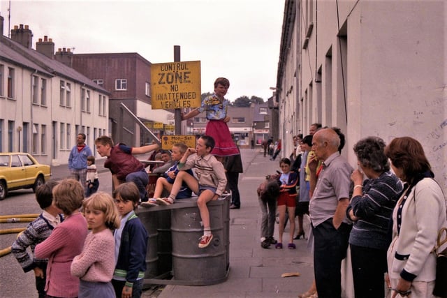 Quay Street residents watch fire at the Paper Mill, July 19, 1983.