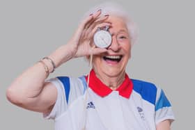 Lady Mary Peters is captured with her stopwatch as part of the USL online exhibition ‘Objects of Resilience’ (Credit: Collette O'Neill)