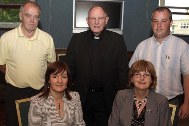 Pictured at McLaughlin's Corner in 2009 where a presentation night was held for helpers and officers following an Irish Culture Week at St Mary's GAA Rasharkin are Sharon O'Kane, Chair of Irish Group, Evelyn McMullan, Committee, Anthony McMullan, Chair of GAA, Fr Murphy and Brian O'Neill