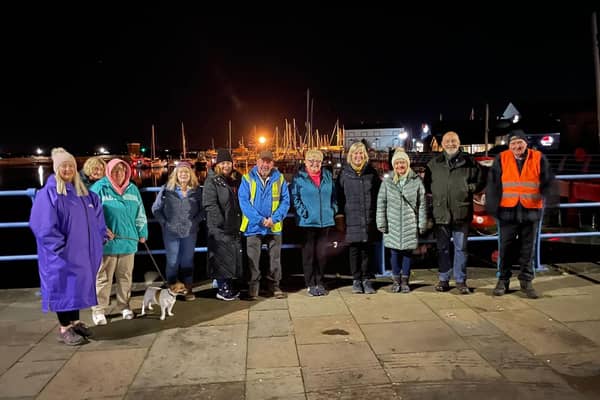 Some of the Chill walking group at Carrickfergus Castle car park.  Photo: Chill walking group