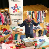 Ald Stephen Ross pictured with over 500 items donated in aid of the Winter Woolies campaign.