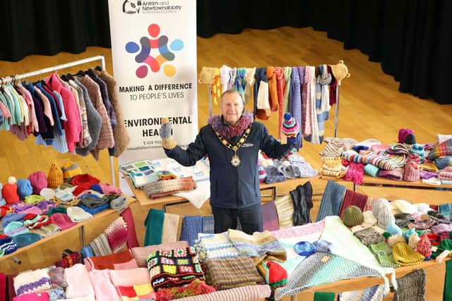 Ald Stephen Ross pictured with over 500 items donated in aid of the Winter Woolies campaign.