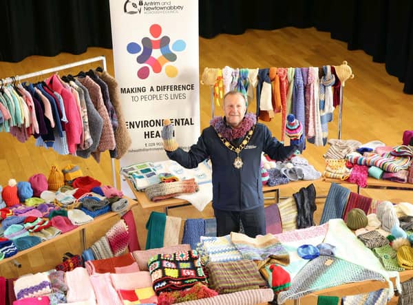 Ald Stephen Ross pictured with over 500 items donated in aid of the Winter Woolies campaign.