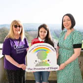 Aideen McMullan from Lisburn is pictured with Eleanor Ellerslie of Cruse Bereavement Support NI, and Beverley Brown of James Brown & Sons, at the launch of The Teenage Youth Bereavement Project, a video support resource which includes testimonies from young people about their own grief journey, discussion of personal experience following loss, and guidance on how to address grief, in a bid to support their peers who find themselves facing the death of someone they loved.