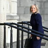 Sinn Fein's Michelle O'Neill is seen arriving at Stormont to be sworn in as Northern Ireland's First Minister . Credit: Charles McQuillan/Getty Images