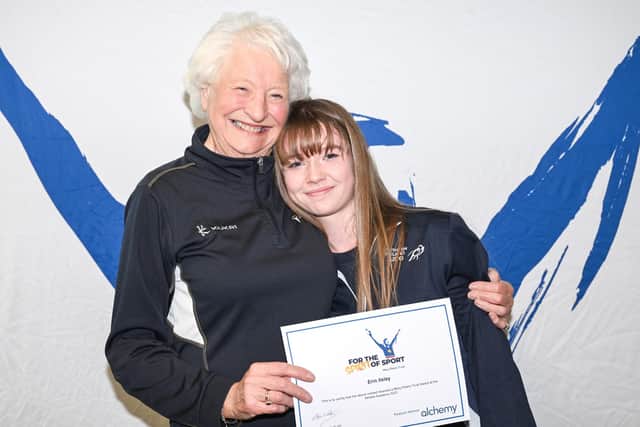 Mary Peters Trust award winner and judo competitor Erin Ilsley from Portstewart is pictured receiving her award from Lady Mary Peters. Credit Mary Peters Trust