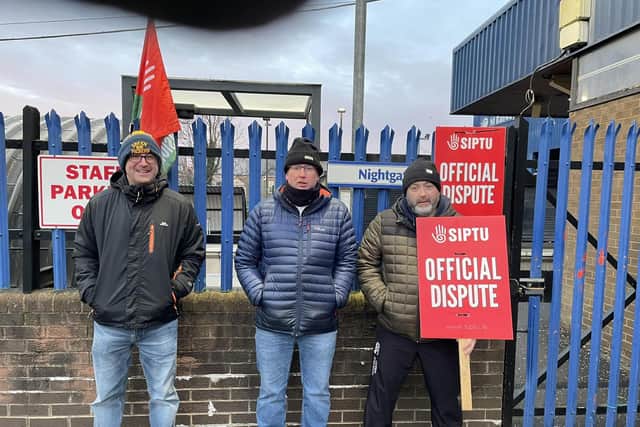 Workers on the picket line at Lurgan Train Station as Translink staff take strike action across Northern Ireland over pay.
