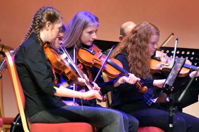 Markethill Fiddle Orchestra in performance at the RBL Festival Of Remembrance. PT44-212.