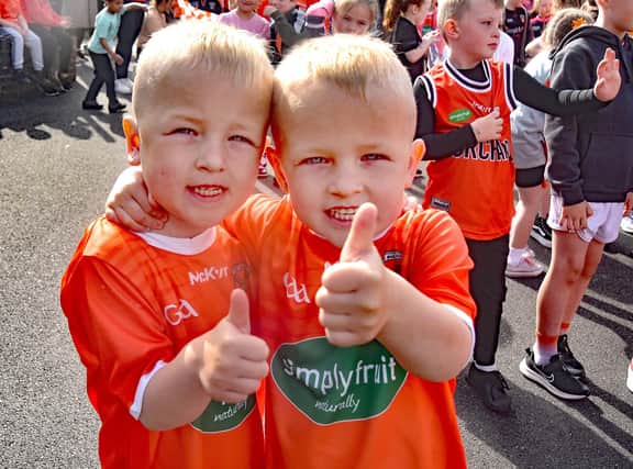 Thumbs up for the Armagh team ahead of Sunday's final from twins Jake, left, and Jayden Mulholland. PT19-205. Pictures by Tony Hendron