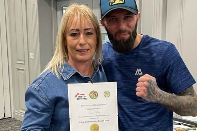 Sandra Gray was awarded Club and Community Coach of the year, pictured with World Champion Anthony Cacace.