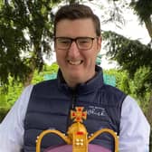 Ian with the crown cake he designed for the royal visit to Newtownabbey.