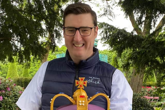 Ian with the crown cake he designed for the royal visit to Newtownabbey.