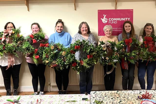 Members of The Diamond Community Development Association taking part in holly wreath workshops in the run up to Christmas. The group has received a £9,350 grant from The National Lottery Community Fund to run activities, including reminiscence sessions and festive events, to improve the wellbeing of the local community.