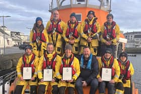 Colm Watters, Johnny Weston, Roo McCrudden, Dan Thorne and Ben Wilson were presented with their commendations during an exercise on November 30 by Lifeboat Operations Manager Beni McAllister. CREDIT RNLI