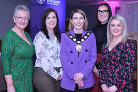 MC Carol Doey pictured with speaker Claire O'Hanlon, Chair of Mid Ulster District Council, Corá Corry, Nichola Simpson from Causeway and Mid Ulster Women's Aid and speaker Annette Kelly.