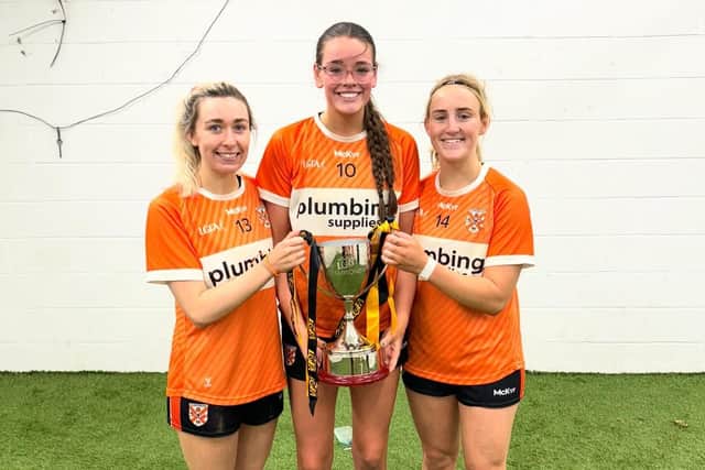 Lurgan girl Niamh Murray with some of her Clann Eireann Ladies GAA team mates after they won the Ulster Championship.
