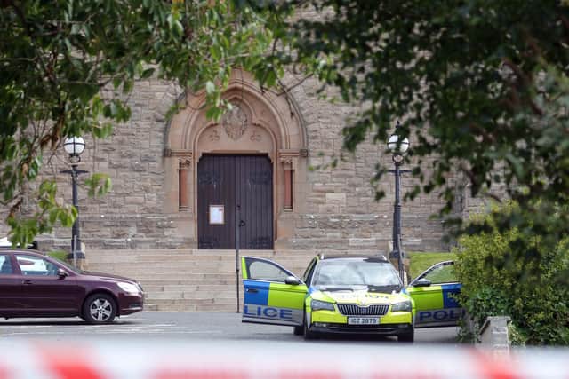 Police at St Patrick's Church following the assault. Photo: Press Eye