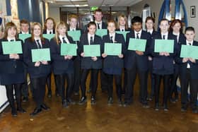 Pupils in year 11 and 12 at Fort Hill College in 2006 with their Top of Form Certificates.