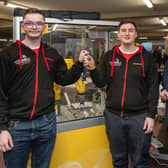 NRC lecturer Carla Koch with Worldskills Bronze medallists Jason Scott and Charlie Carson