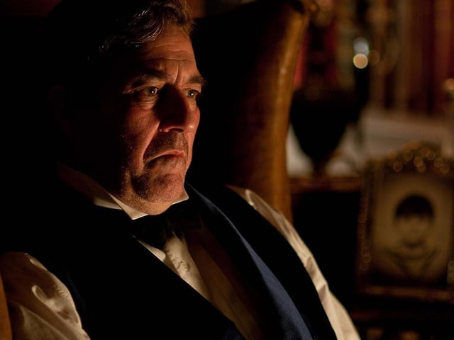 Although Ciarán Hinds plays a supporting role in the 2012 ‘The Woman In Black’, his character, Samuel Daily, is one of the few who attempts to help the lead Arthur Kipps as he investigates the mysterious and paranormal.
Known for his strong acting abilities, Ciarán’s performance as Samuel is no exception. Bringing depth and authenticity to the role, Ciarán is fundamental to conveying a mix of scepticism, concern, and fear as the supernatural events unfold, contributing to the overall atmosphere of tension and dread throughout the movie.