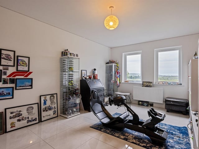 Games room/family room/bedroom with elevated rural views.