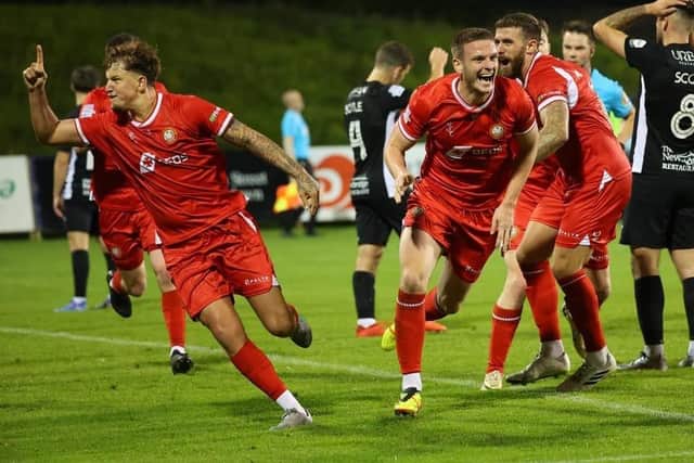 Dougie Wilson celebrating dramatic late equaliser