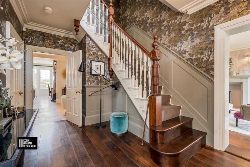 Entrance hall with solid timber flooring.