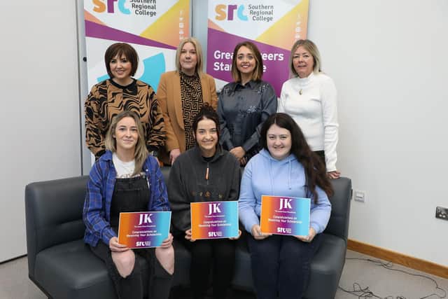 Receiving the James Kane Scholarship from Board Member Lynn Connaughton were SRC students Jennifer McParland, Jodie Davidson, Amy Ringland.