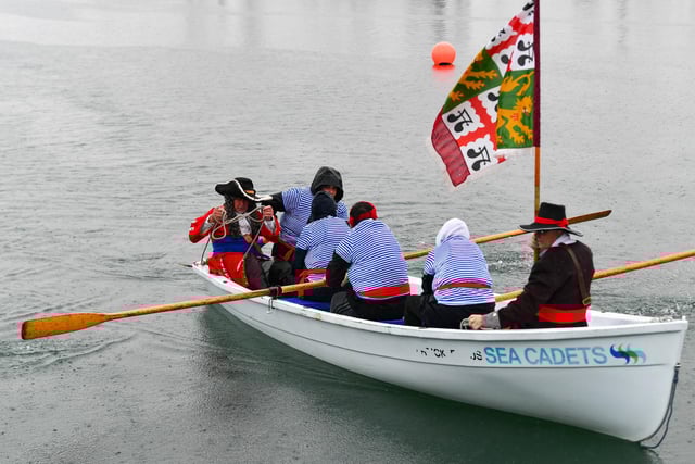 The re-enactment of the landing of King William in Carrickfergus Harbour.