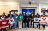 Representatives from the four men’s teams competing in the 2025 Friendship Four, with Governor Maura Healey, Governor of Massachusetts; Martin McDowell, Chair of The Odyssey Trust; and Joseph Kennedy III, United States Special Envoy for Northern Ireland