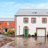 This Georgian style coach house is on the market now