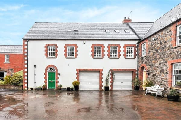 This Georgian style coach house is on the market now