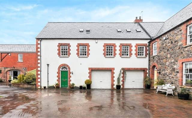 This Georgian style coach house is on the market now