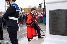 Mayor Councillor Kurtis Dickson lays his wreath.