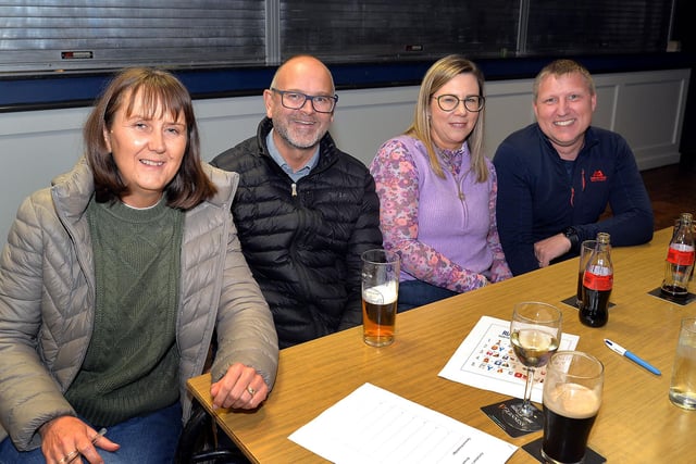 Enjoying the Portadown College rugby charity quiz are from left, Arlinda and George Benson and Susan and Stephen Todd. PT43-211.