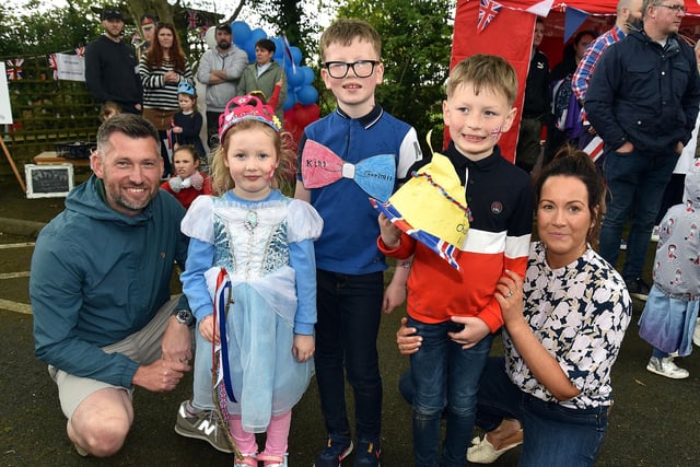 Enjoying the fun at the Derryhale Primary School Coronation Party on Friday are the Gaston Family including from left, dad, Robbie, Pippa (5), Joe (9), Logan (7) and mum Cheryl. PT18-202.
