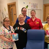 Ulster Hospital Children’s Ward Nurses and Play Specialist’s thank parent Charlene Beattie for her kind donation. Pic credit: SEHSCT
