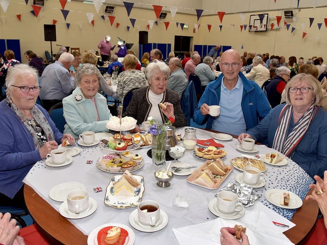 Smiles all round as members of the Richhill Presbyterian Tuesday Morning Club enjoy the group's Coronation Tea. PT17-276.