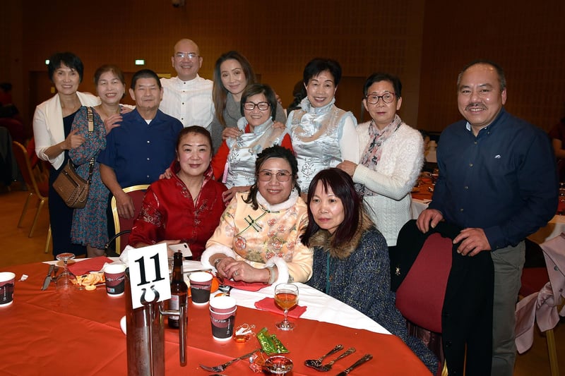 Squeezing in for a photo are members of the Craigavon Chinese community during the New Year celebrations. PT04-212.