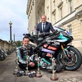 Communities Minister Gordon Lyons pictured with motorbike rider, Michael Dunlop at a reception in his honour at Parliament Buildings. CREDIT DEPARTMENT FOR COMMUNITIES
