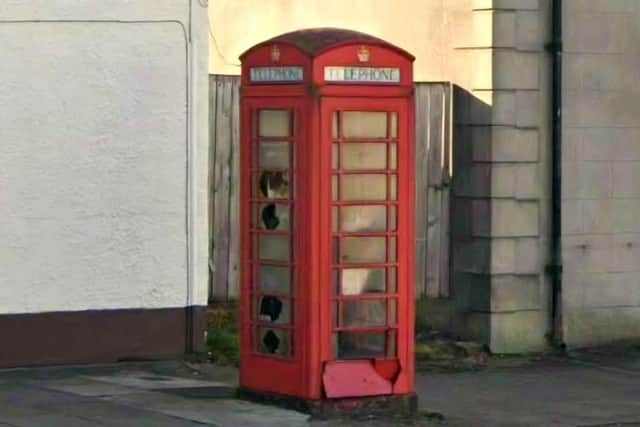 The listed BT phone kiosk at 46/48 St. Patrick's Street, Draperstown, could be fitted with a defibrillator and fully restored. Credit: Google