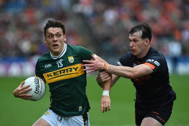 Armagh’s Barry McCambridge gets to grips with Kerry’s David Clifford.