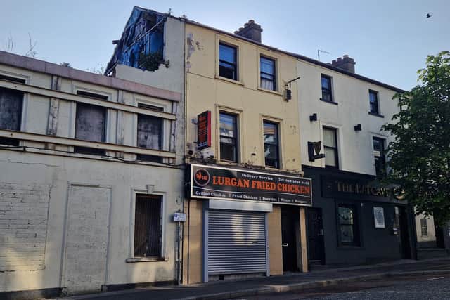 Fire at property in William Street, Lurgan, Co Armagh. Three people were rescued from a flat above Lurgan Fried Chicken.