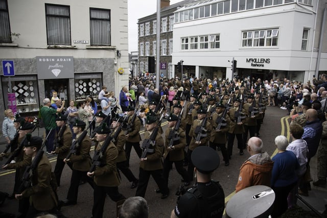 The parade through the town centre was watched by residents and visitors.