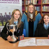 Tandragee Junior High School vice principal, Mrs Laverne Inns pictured with two of the musical prize winners at the school prize day including, Rachel Lowe, left, prizes for drums and choir, and Hannah Heak, prizes for music. PT44-210.