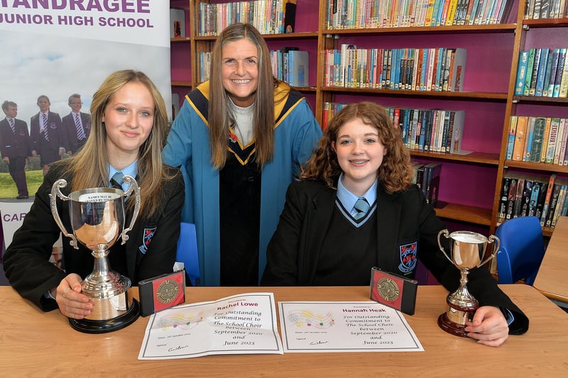 Tandragee Junior High School vice principal, Mrs Laverne Inns pictured with two of the musical prize winners at the school prize day including, Rachel Lowe, left, prizes for drums and choir, and Hannah Heak, prizes for music. PT44-210.